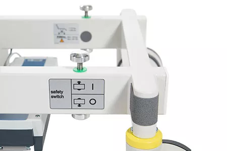 Interruttore di sicurezza sulla poltrona per mammografia